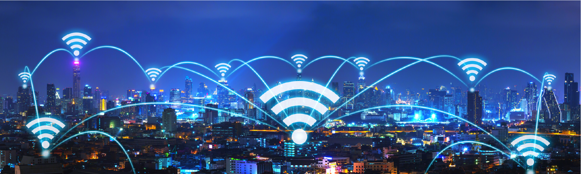 Image of city building skyline with Wi-Fi symbols connected over the top.